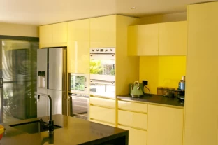 Contemporary Kitchen in Gloss Two-Pack with Recessed Handles and Caesarstone Benchtops, in Adelaide South Australia by Compass Kitchens