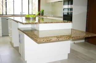 Contemporary Style Kitchen Renovation in Adelaide with a satin Two-Pack finish and Granite Cantilever benchtops by Adelaide’s Compass Kitchens