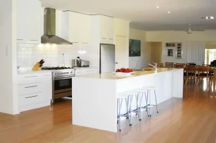 Gloss White Two Pack Kitchen Renovation with Caesarstone Benchtops with Waterfall Ends in Victor Harbor by Adelaide’s Compass Kitchens