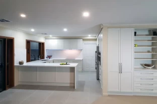 Transitional Matte Two-Pack Kitchen with Caesarstone Tops & Splashbacks  with Bulkhead and Shadow Moulding by Compass Kitchens at Coromandel Valley
