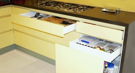 Lots of easy access storage designed by Compass Kitchens