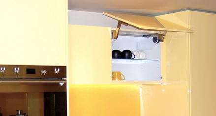 Motorized Aventos lift up flaps by Compass Kitchens