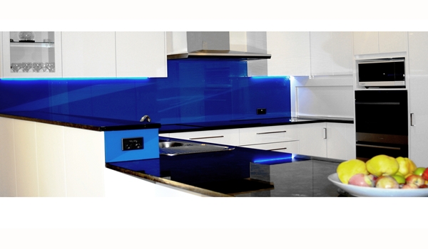 Adelaide Kitchen in Peacock Pearl Granite Tops with Blue Glass Splashbacks by Compass Kitchens